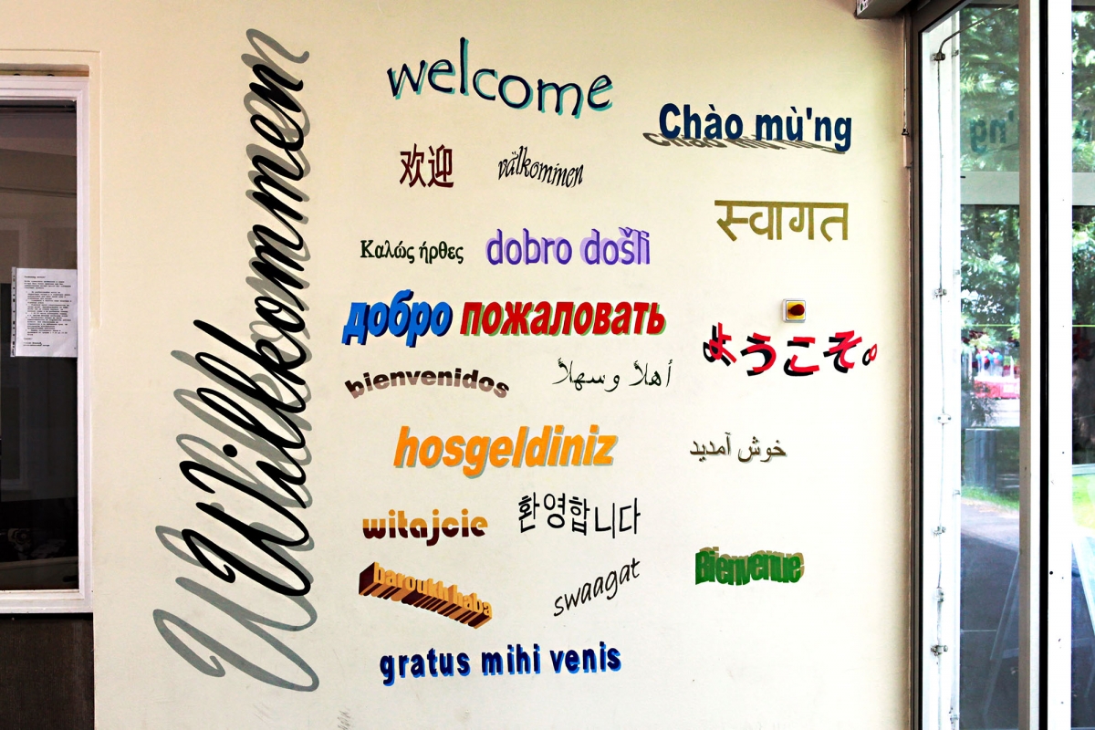 Text in different languages on the wall of the transitional home