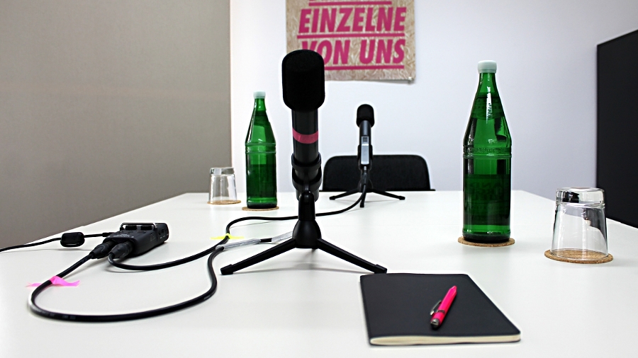Set up interview situation with microphone